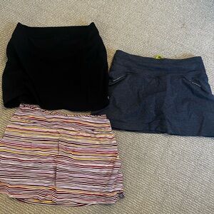3 medium skorts - 2 Athleta and 1 Title Nine
